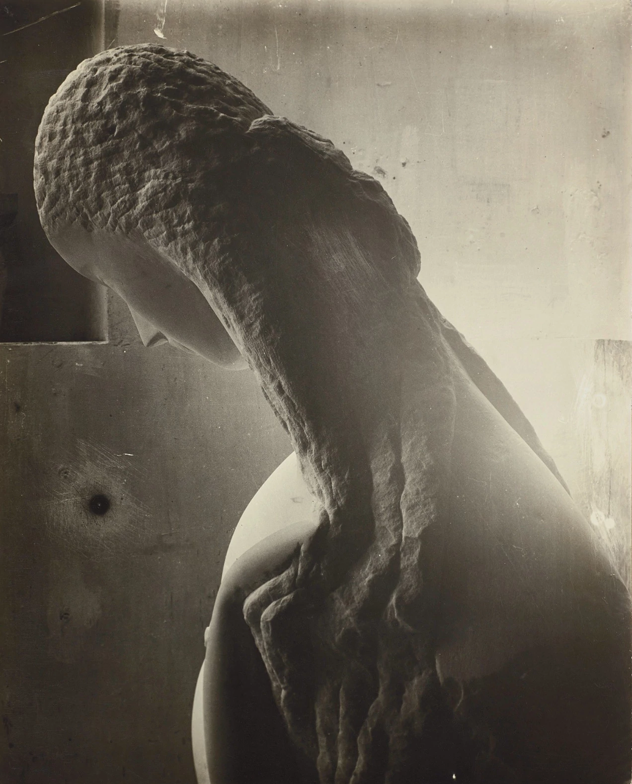 Woman looking into a mirror, Constantin Brancusi